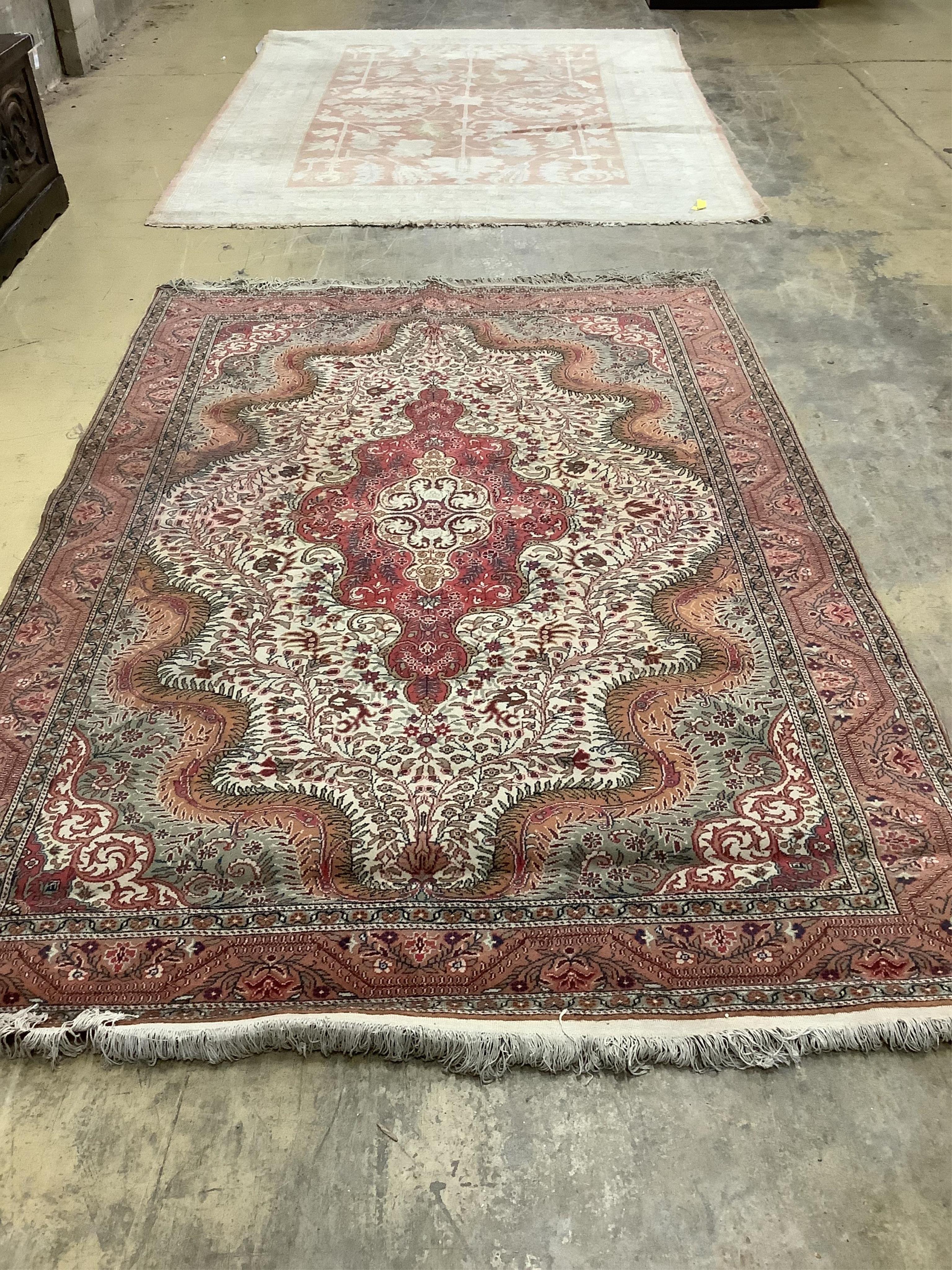 A Persian style beige ground carpet, 290 x 197cm. Condition - fair to good